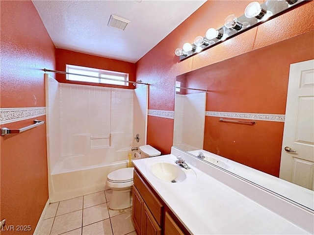 5704 Burdel St, Las Vegas, NV 89149 - full bath featuring visible vents, vanity, a textured wall, toilet, and tile patterned floors