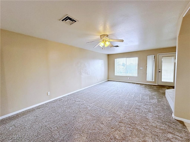 5704 Burdel St, Las Vegas, NV 89149 - carpeted spare room with ceiling fan, visible vents, and baseboards