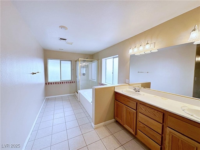 5704 Burdel St, Las Vegas, NV 89149 - bathroom featuring a sink, tile patterned flooring, a stall shower, and double vanity
