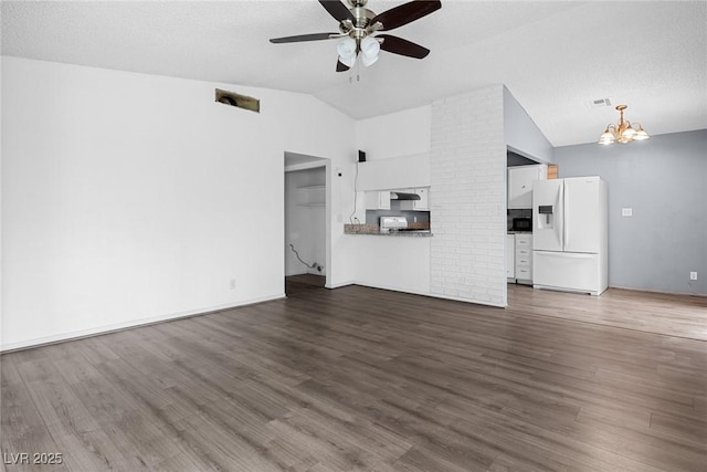 unfurnished living room featuring high vaulted ceiling, ceiling fan with notable chandelier, dark wood finished floors, and visible vents