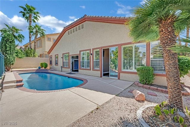 view of swimming pool with a patio, a fenced backyard, and a fenced in pool