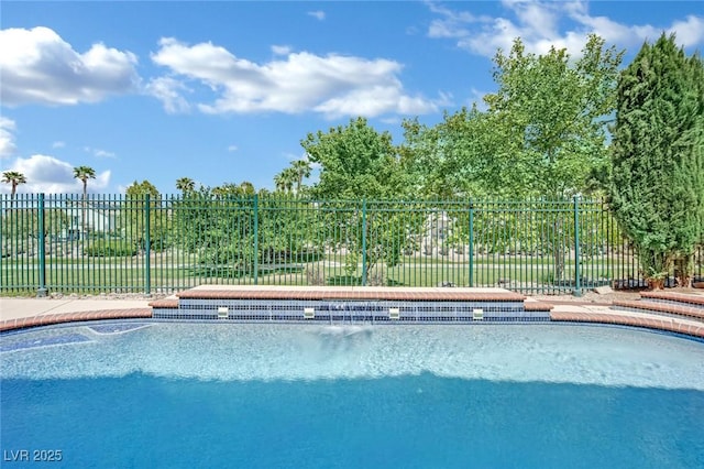view of pool with fence and a fenced in pool