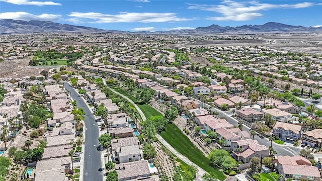 bird's eye view featuring a residential view and a mountain view