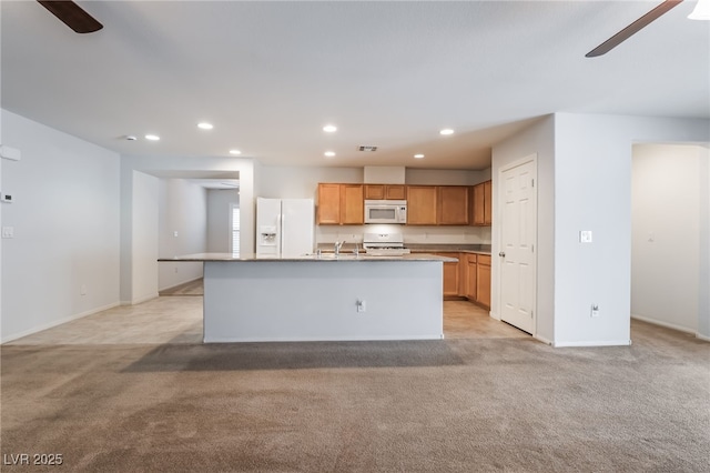 4436 Hatch Bend Ave, North Las Vegas, NV 89031 - kitchen featuring recessed lighting, ceiling fan, light carpet, and white appliances