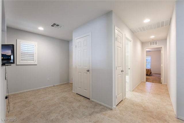 4436 Hatch Bend Ave, North Las Vegas, NV 89031 - corridor with recessed lighting, visible vents, and light tile patterned floors