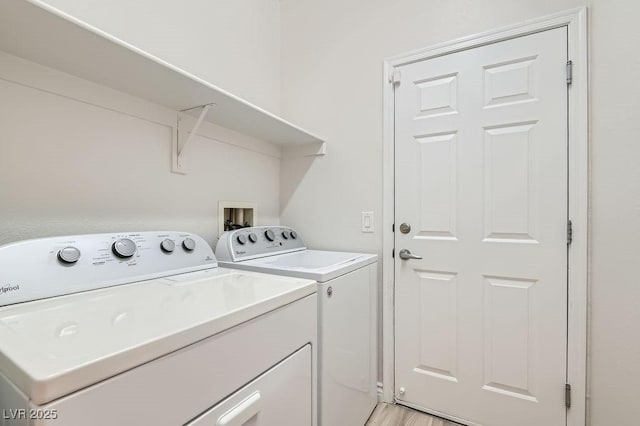 laundry room featuring washing machine and dryer