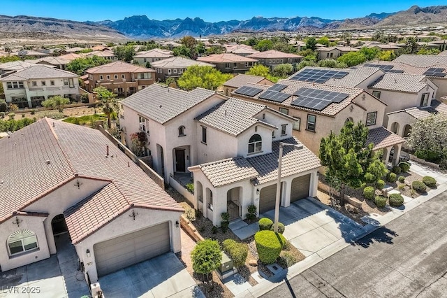 aerial perspective of suburban area featuring mountains