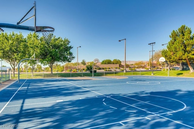 view of sport court featuring community basketball court and fence