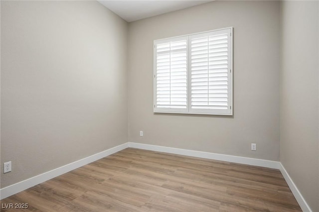 3278 Turning Bridge St, Las Vegas, NV 89135 - unfurnished room featuring baseboards and wood finished floors