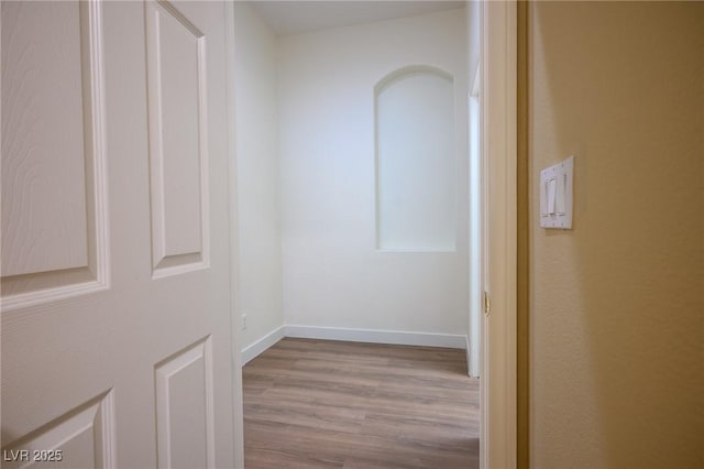 3278 Turning Bridge St, Las Vegas, NV 89135 - corridor with baseboards and wood finished floors