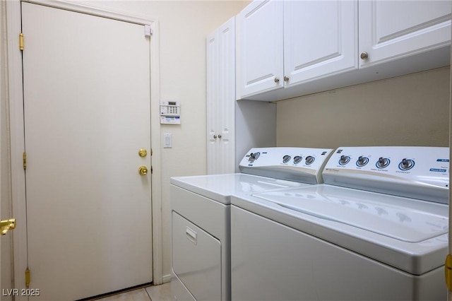 3278 Turning Bridge St, Las Vegas, NV 89135 - clothes washing area featuring independent washer and dryer, light tile patterned flooring, and cabinet space