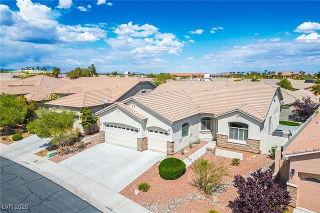 3278 Turning Bridge St, Las Vegas, NV 89135 - view of front facade with a garage, stone siding, stucco siding, a tiled roof, and a residential view