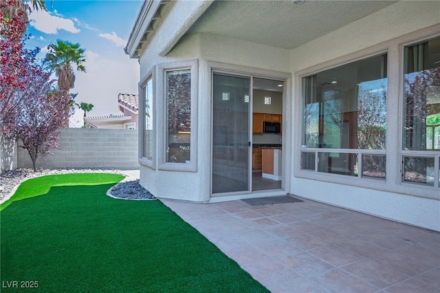 3278 Turning Bridge St, Las Vegas, NV 89135 - doorway to property with fence, a patio, and stucco siding