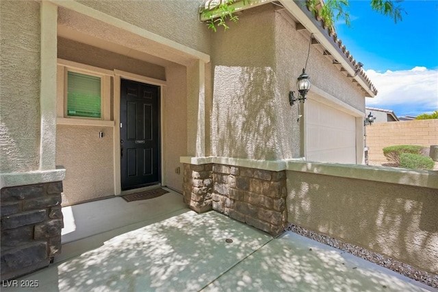 5631 Hill Cliff Ct, North Las Vegas, NV 89031 - entrance to property featuring stucco siding