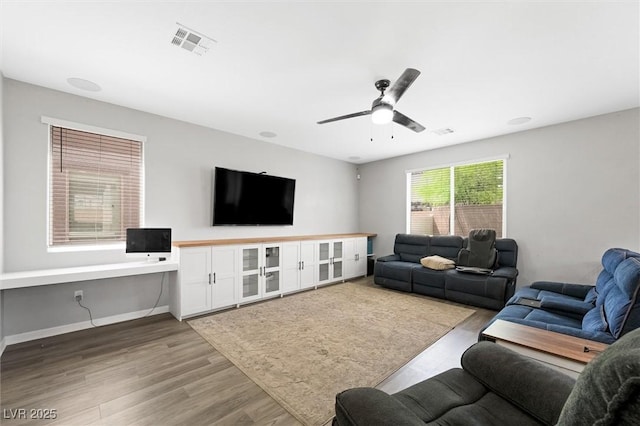 5631 Hill Cliff Ct, North Las Vegas, NV 89031 - living room featuring wood finished floors and ceiling fan