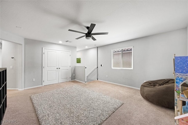 5631 Hill Cliff Ct, North Las Vegas, NV 89031 - sitting room featuring carpet, an upstairs landing, a ceiling fan, baseboards, and recessed lighting