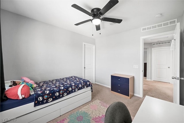 5631 Hill Cliff Ct, North Las Vegas, NV 89031 - bedroom featuring light carpet, baseboards, and ceiling fan