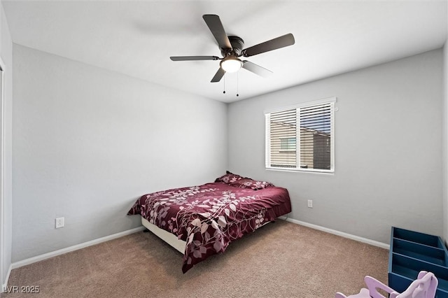 5631 Hill Cliff Ct, North Las Vegas, NV 89031 - carpeted bedroom featuring baseboards and a ceiling fan
