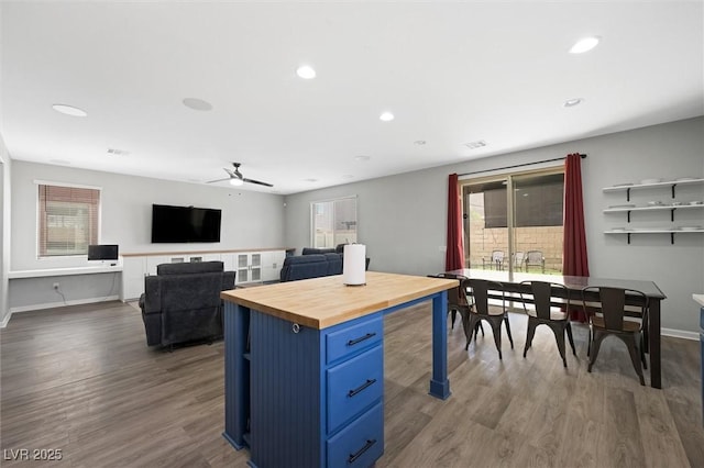 5631 Hill Cliff Ct, North Las Vegas, NV 89031 - kitchen featuring blue cabinetry, butcher block countertops, a ceiling fan, plenty of natural light, and recessed lighting