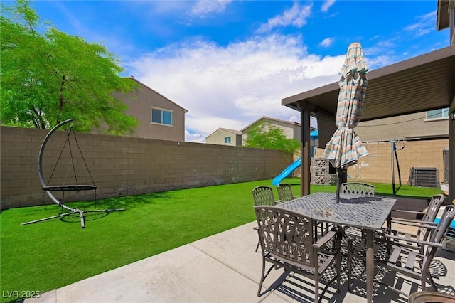 5631 Hill Cliff Ct, North Las Vegas, NV 89031 - view of patio / terrace with a playground and outdoor dining space