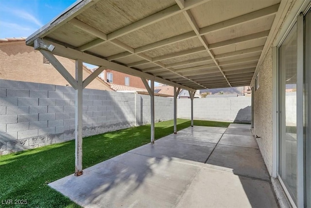 view of patio with a fenced backyard