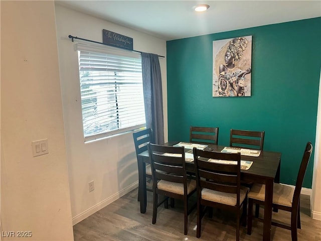 2872 Atomic Tangerine Way Unit 2, Las Vegas, NV 89183 - dining area featuring wood finished floors and baseboards