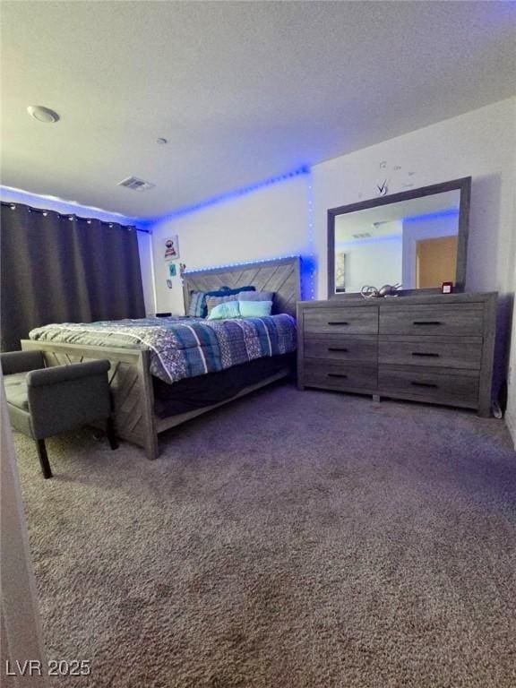 2872 Atomic Tangerine Way Unit 2, Las Vegas, NV 89183 - carpeted bedroom with a textured ceiling