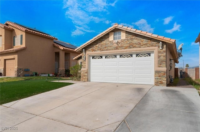 2903 Galena Peak Ln, Las Vegas, NV 89156 - view of front of property featuring a front lawn, a tile roof, a garage, stone siding, and driveway