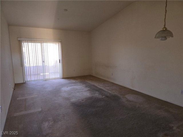 833 Aspen Peak Loop Unit 1524, Henderson, NV 89011 - unfurnished room featuring carpet flooring and vaulted ceiling
