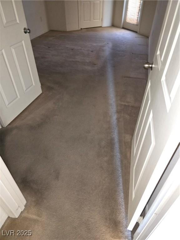 833 Aspen Peak Loop Unit 1524, Henderson, NV 89011 - unfurnished bedroom with carpet floors