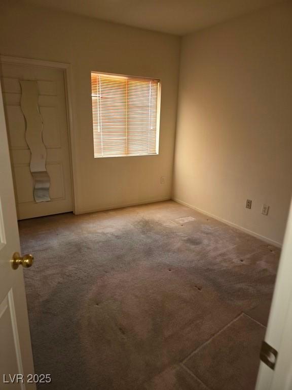 833 Aspen Peak Loop Unit 1524, Henderson, NV 89011 - carpeted empty room featuring baseboards