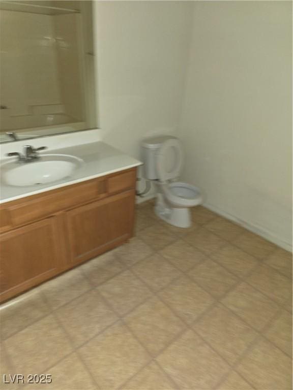 833 Aspen Peak Loop Unit 1524, Henderson, NV 89011 - bathroom with vanity, baseboards, and toilet