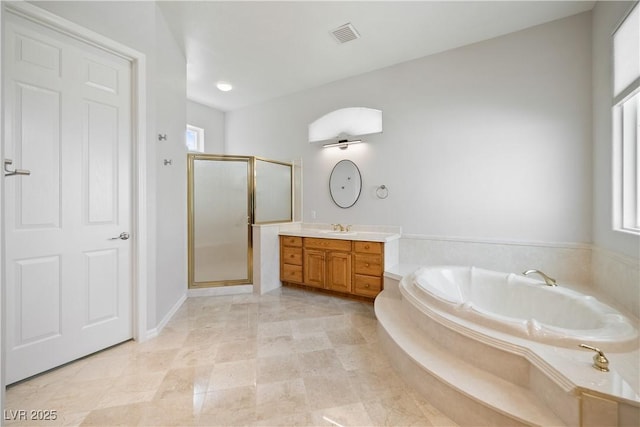2742 Darby Falls Dr, Las Vegas, NV 89134 - full bathroom with vanity, a stall shower, and a garden tub