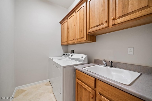 2742 Darby Falls Dr, Las Vegas, NV 89134 - laundry room featuring cabinet space, washing machine and dryer, baseboards, and light tile patterned floors