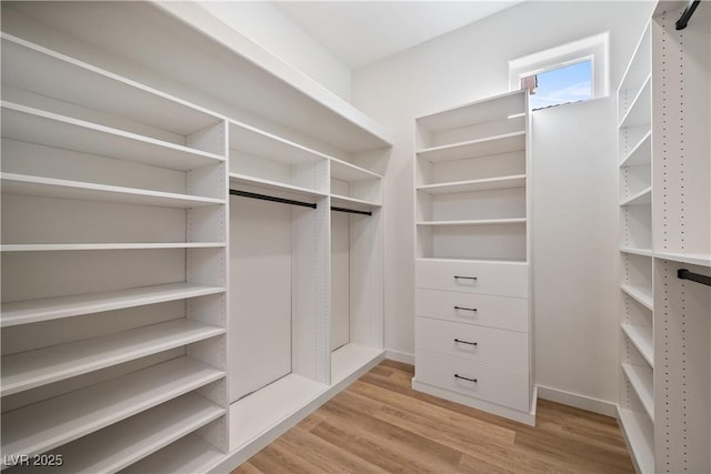 2742 Darby Falls Dr, Las Vegas, NV 89134 - walk in closet featuring light wood finished floors