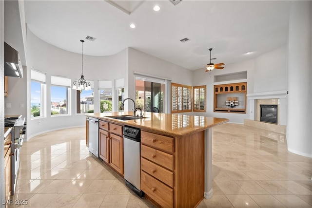 2742 Darby Falls Dr, Las Vegas, NV 89134 - kitchen featuring light tile patterned flooring, baseboards, a towering ceiling, dishwasher, and a ceiling fan