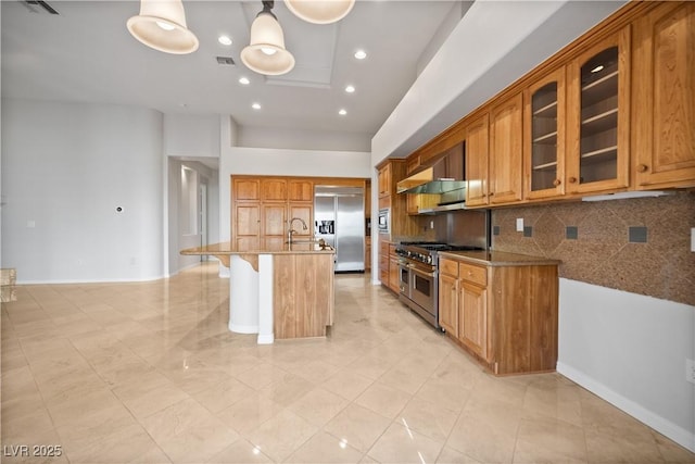 2742 Darby Falls Dr, Las Vegas, NV 89134 - kitchen with high end appliances, backsplash, a kitchen breakfast bar, glass insert cabinets, and a center island with sink