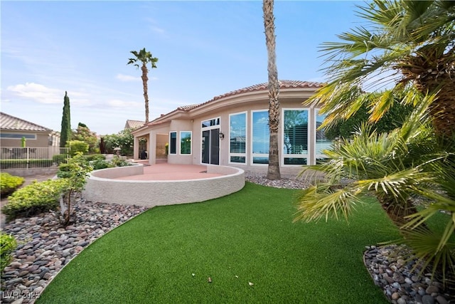 2742 Darby Falls Dr, Las Vegas, NV 89134 - rear view of property featuring a patio area, a tiled roof, and stucco siding