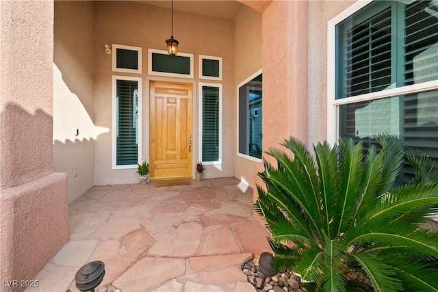2742 Darby Falls Dr, Las Vegas, NV 89134 - doorway to property with stucco siding