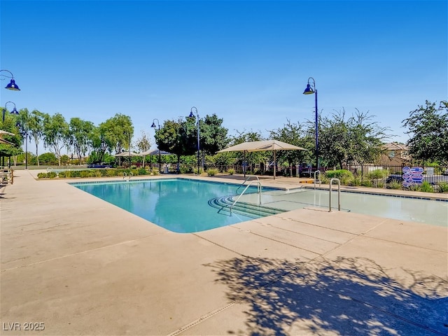 3008 Barrett Springs Ave, Henderson, NV 89044 - community pool featuring fence and a patio