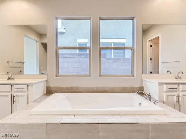 3008 Barrett Springs Ave, Henderson, NV 89044 - bathroom with a garden tub, a sink, and two vanities