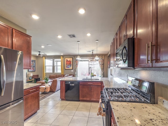 kitchen with visible vents, a peninsula, open floor plan, a sink, and black appliances