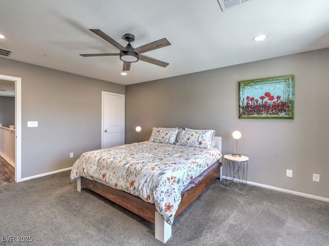 carpeted bedroom with a ceiling fan, baseboards, and recessed lighting