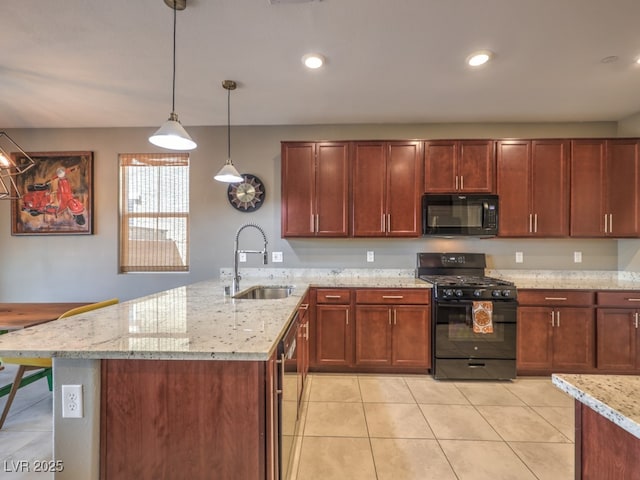 kitchen featuring light stone countertops, a sink, a peninsula, light tile patterned floors, and black appliances