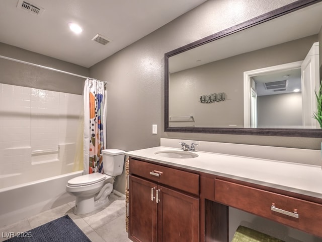 bathroom featuring tile patterned floors, vanity, toilet, and visible vents