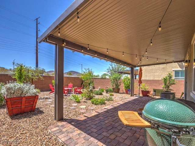 view of patio featuring a fenced backyard and outdoor dining area