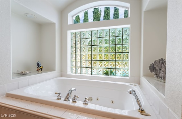 bathroom featuring a jetted tub