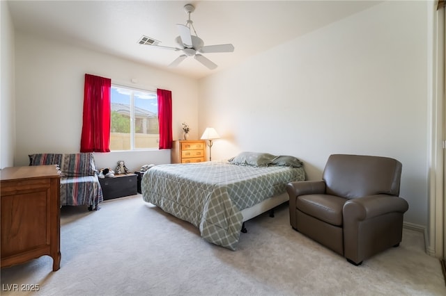 bedroom with carpet, a ceiling fan, and visible vents