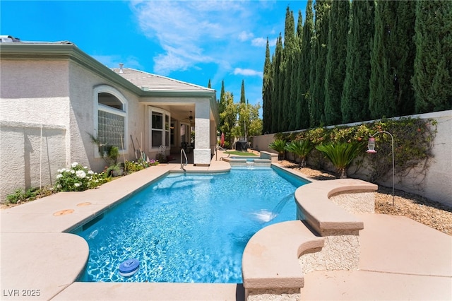 view of pool featuring a fenced in pool, an in ground hot tub, a patio area, and a fenced backyard