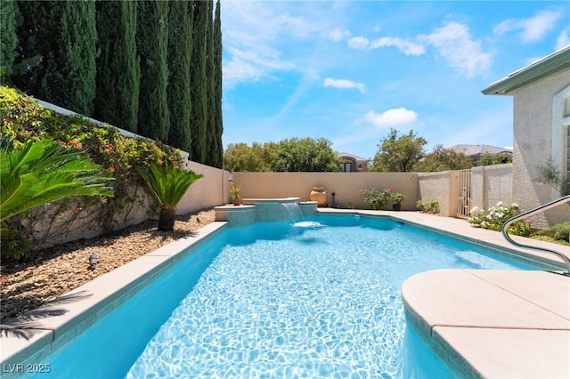 view of swimming pool with a fenced in pool and a fenced backyard